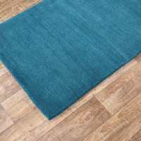 Ručně všívaný kusový koberec Asra wool petrolej