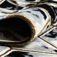 Kusový koberec Allure 1966 black/gold