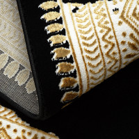 Kusový koberec Allure 1965 black/gold