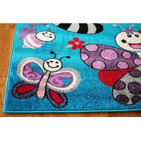 Dětský koberec MOTÝLI - tyrkysový