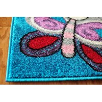 Dětský koberec MOTÝLI - tyrkysový