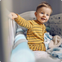 Chránič na dětskou postel pletený do copu RICO 300 cm - modro-šedý