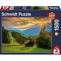 SCHMIDT Puzzle Západ slunce nad horskou vesnicí Wamberg 1500 dílků