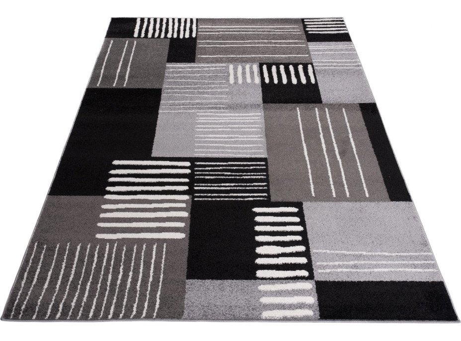 Kusový koberec JÁVA Hachure - tmavě šedý