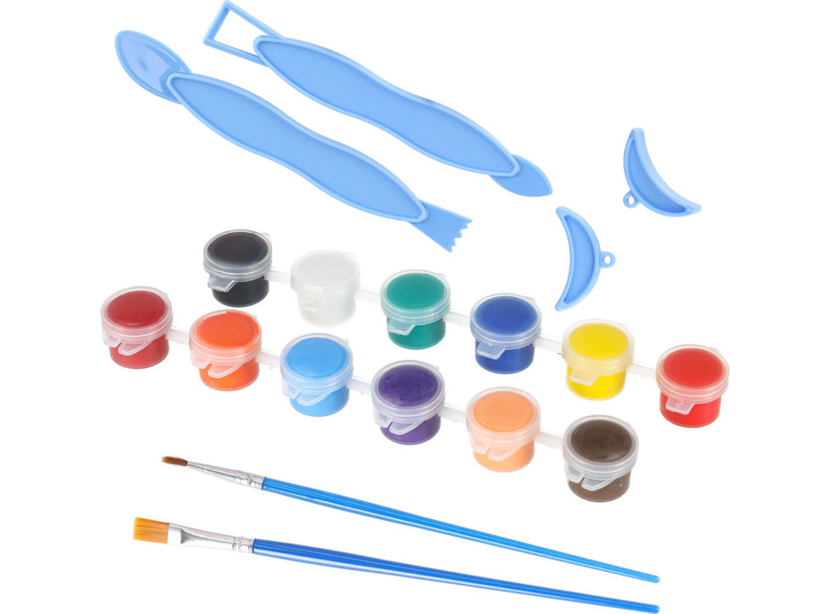 Hrnčířský kruh s hlínou a barvami