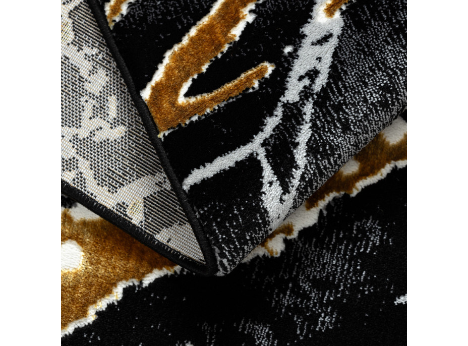Kusový koberec Allure 1963 black/gold